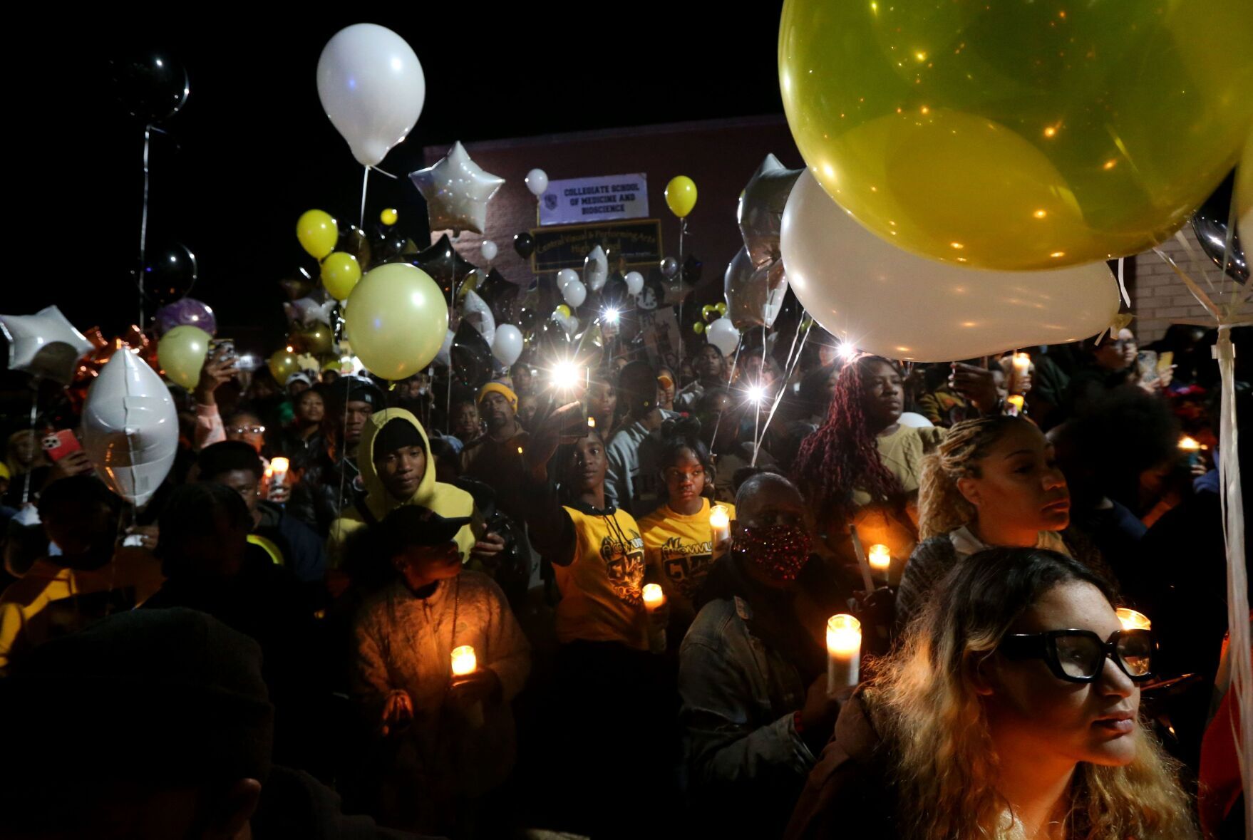 Hundreds of people attend a vigil for the CVPA community